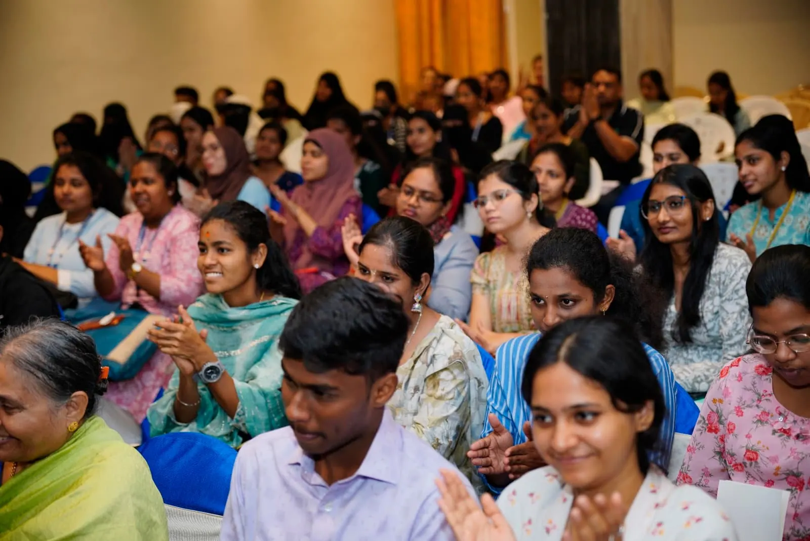 Participants listening during a HolistiCon 2024 session