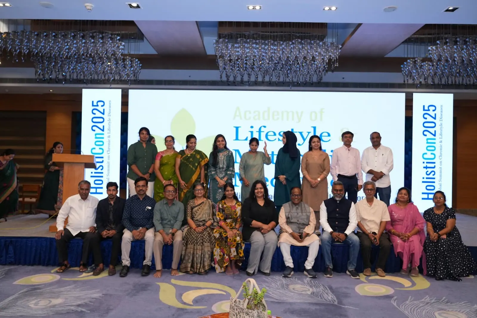 A group photograph of coaches and faculty at HolistiCon 2025