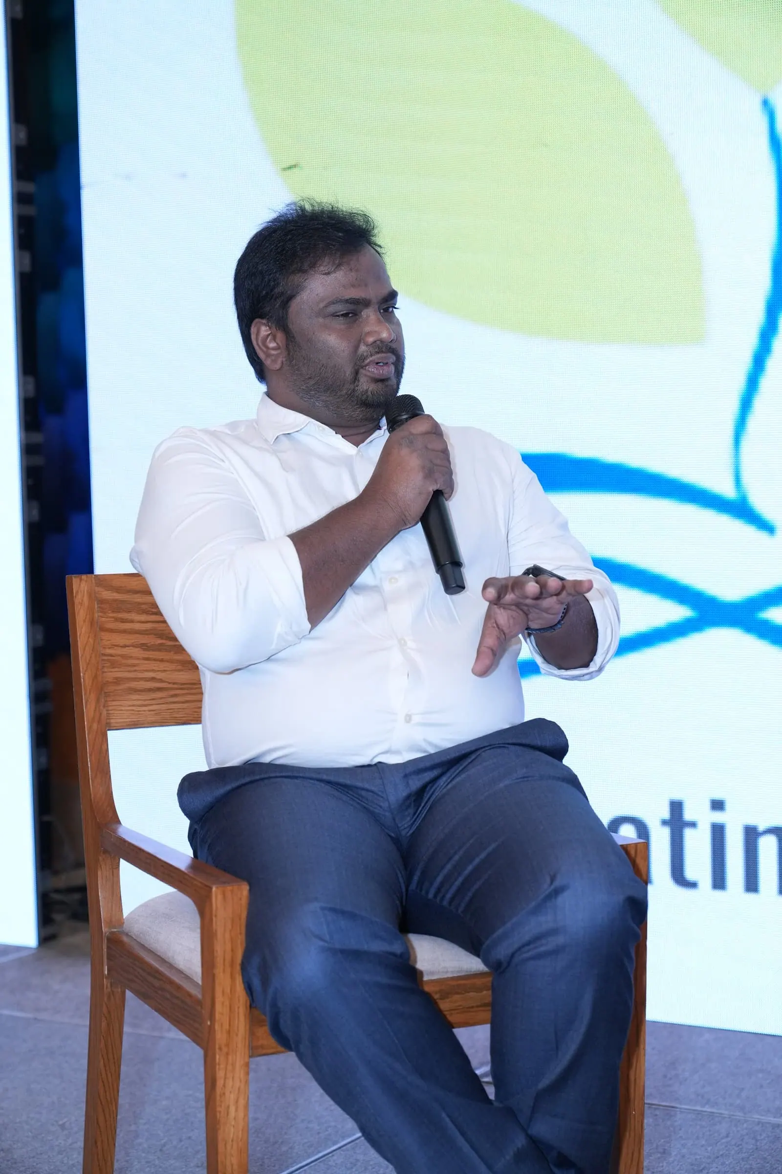 A panellist speaking at HolistiCon 2025